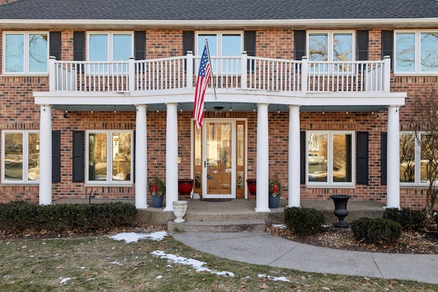 doorway to property with a balcony