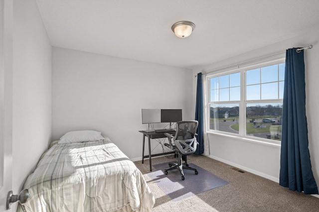 bedroom featuring carpet flooring