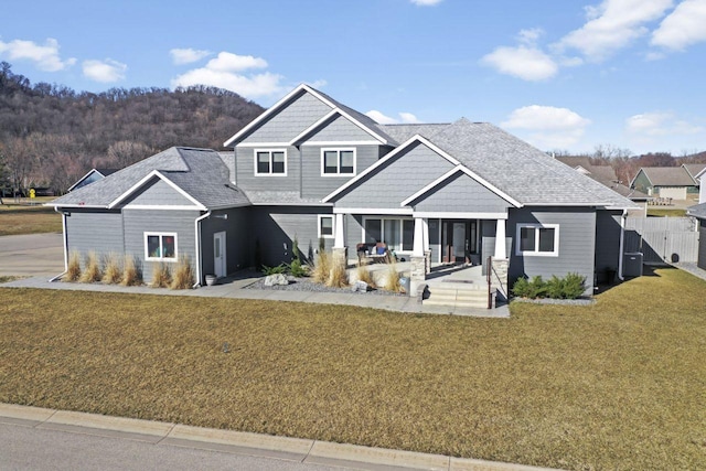 craftsman house with a front yard