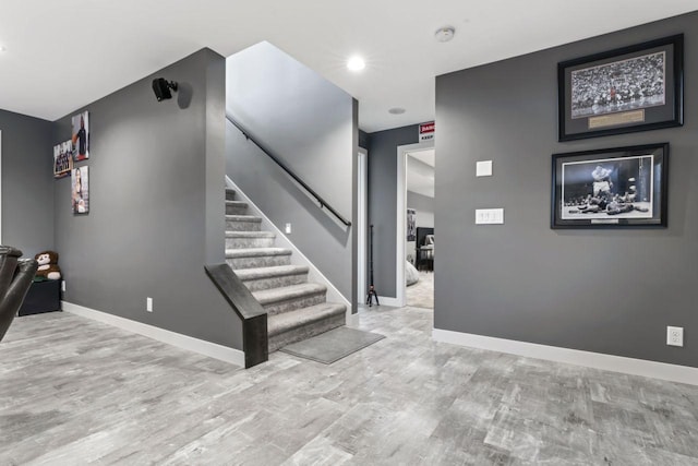 stairs with wood-type flooring