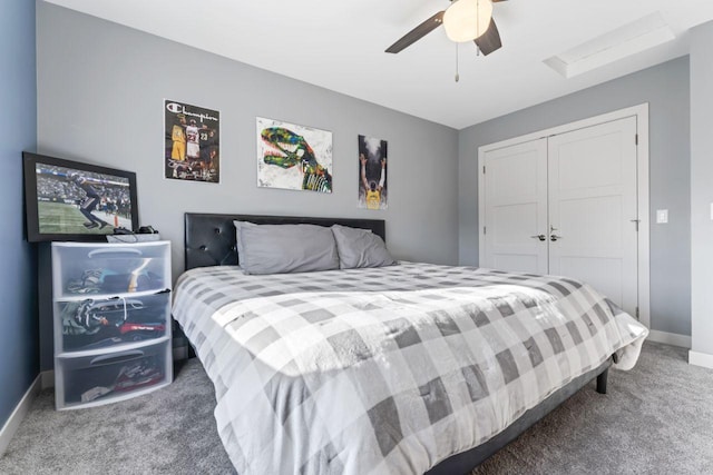 bedroom with a closet, ceiling fan, and carpet