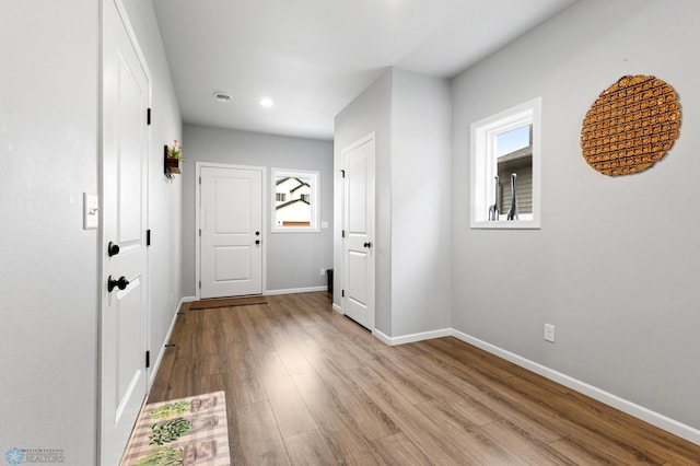 hall with light wood-type flooring