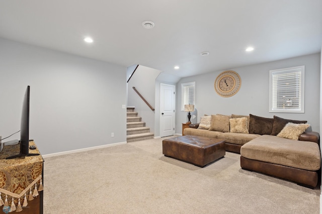 living room featuring light carpet