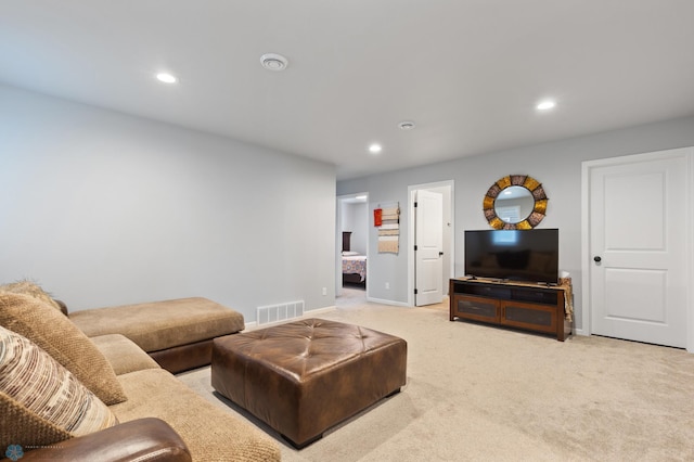 living room featuring light carpet