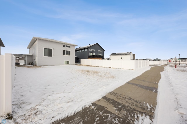 view of snow covered house