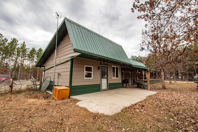 back of house featuring a patio