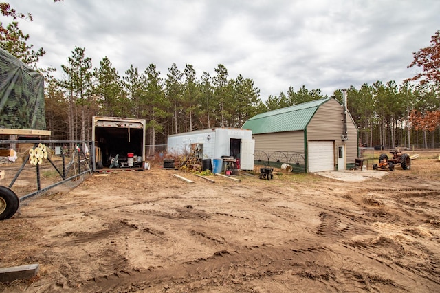 view of outdoor structure with a garage