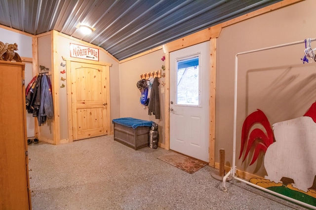 foyer entrance with lofted ceiling