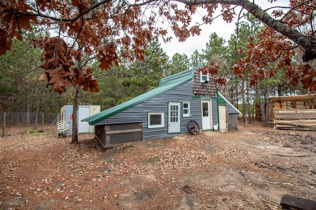 exterior space with an outbuilding