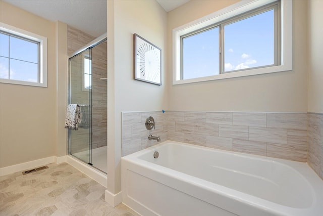 bathroom with independent shower and bath