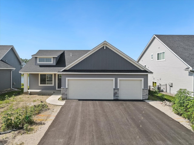 craftsman house featuring a garage