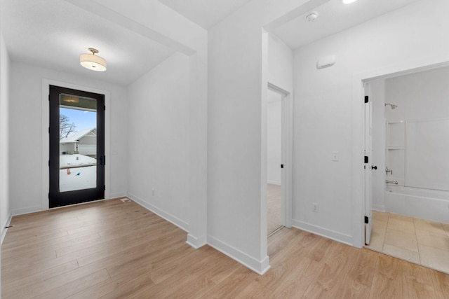 foyer entrance featuring light hardwood / wood-style floors