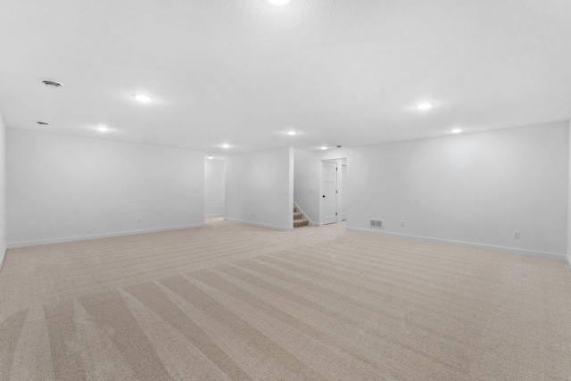 basement with light carpet