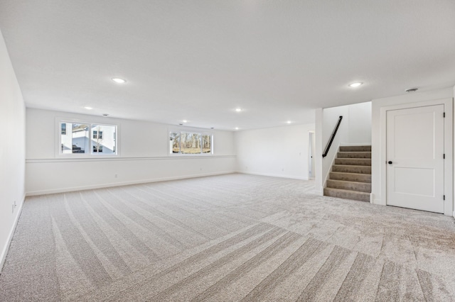 basement with light colored carpet