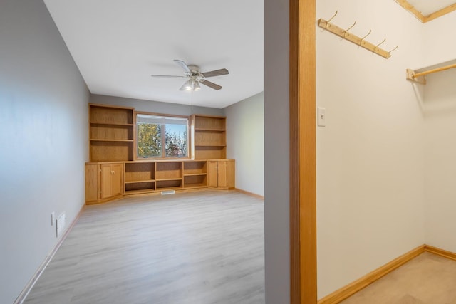 interior space featuring light hardwood / wood-style flooring and ceiling fan