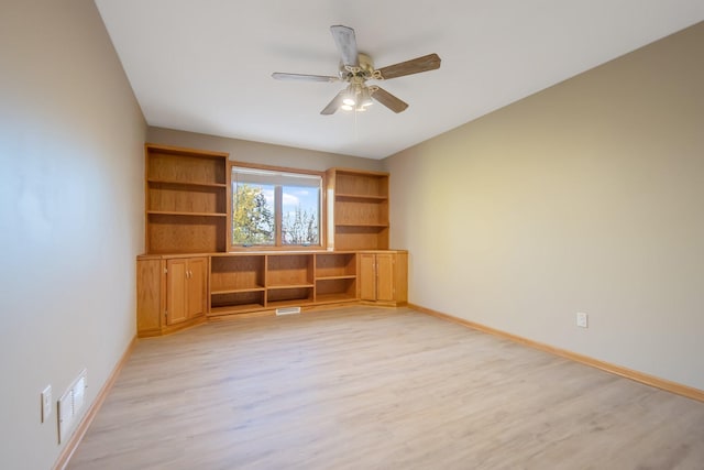 interior space featuring light wood-type flooring and ceiling fan