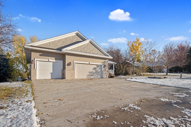 view of property exterior with a garage