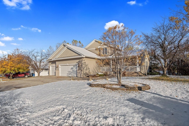 view of front of home featuring a garage and a porch