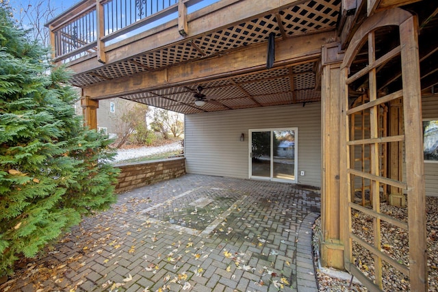 view of patio featuring ceiling fan