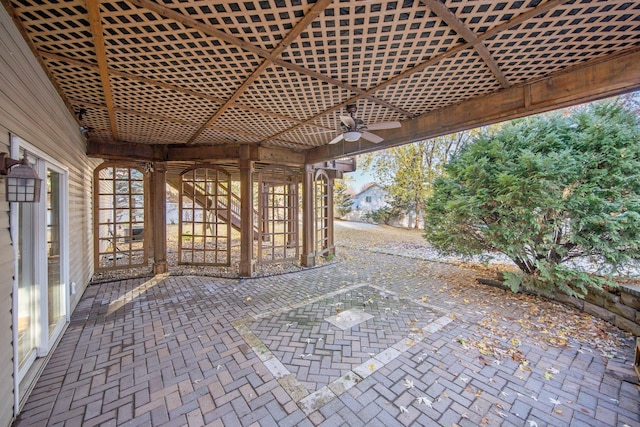 view of patio featuring ceiling fan