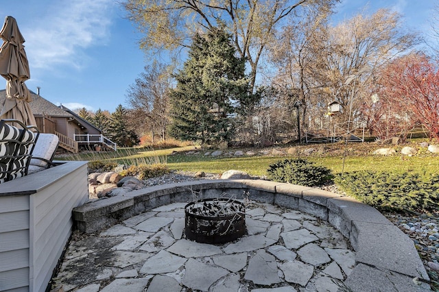 view of patio featuring a fire pit