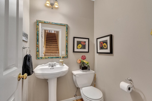 bathroom with toilet and sink