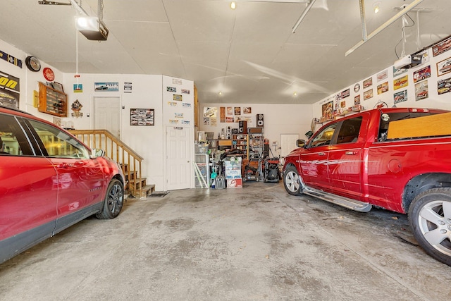 garage featuring a garage door opener