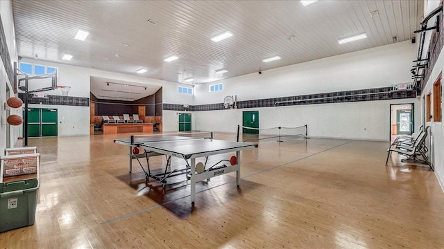 recreation room featuring wood-type flooring and visible vents