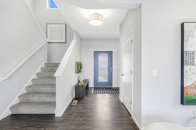 entryway featuring dark wood-type flooring