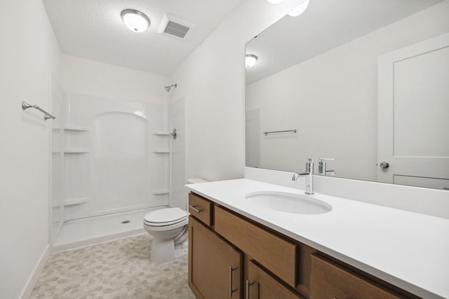 full bath featuring visible vents, toilet, walk in shower, and vanity