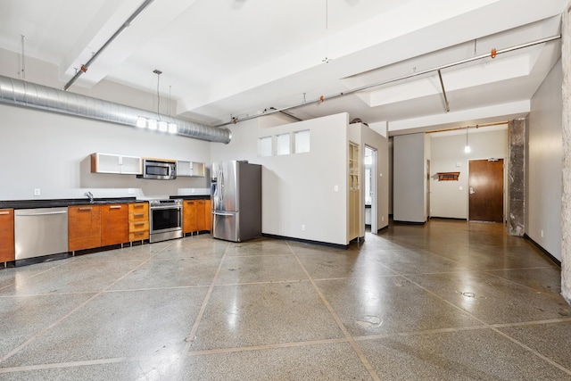 garage with stainless steel refrigerator with ice dispenser