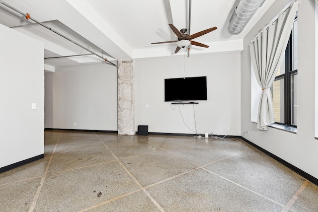 spare room with ceiling fan