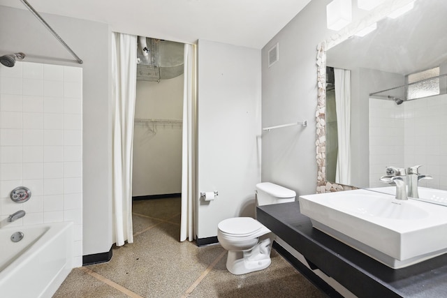 full bathroom with toilet, vanity, and shower / bath combination with curtain