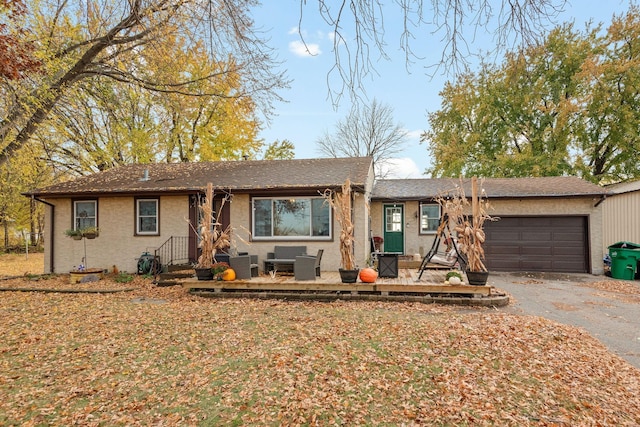 single story home with a garage