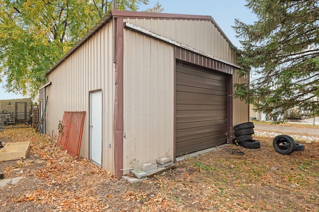 view of outdoor structure with a garage