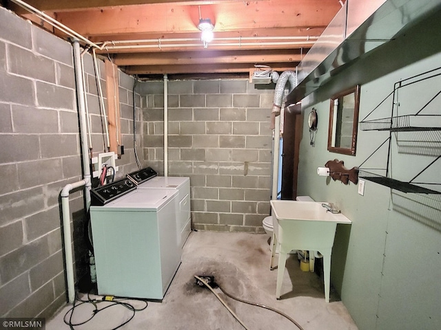 laundry room with independent washer and dryer