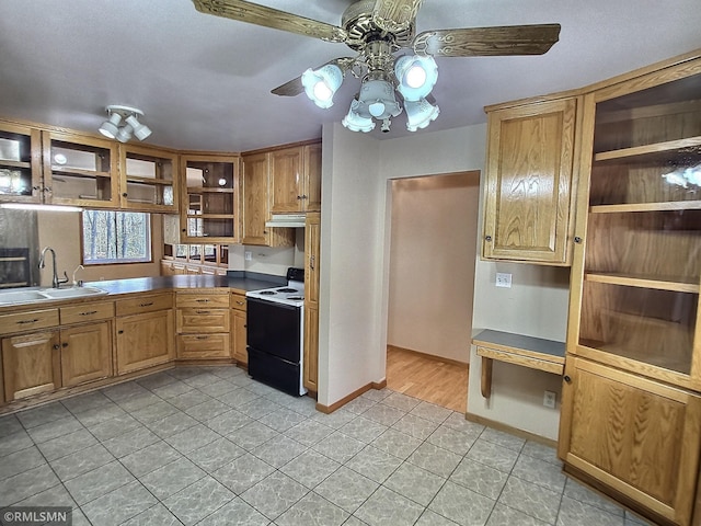 kitchen featuring ceiling fan, light tile patterned flooring, white electric range, and sink