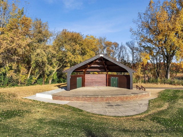 view of outbuilding with a gazebo and a lawn