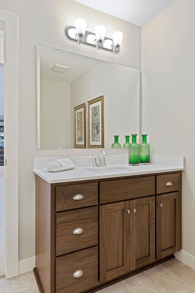 bathroom featuring vanity and tile patterned floors