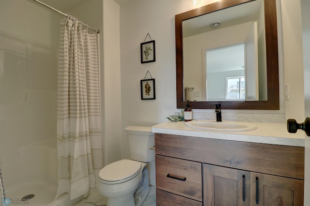 bathroom featuring vanity, toilet, and a shower with curtain