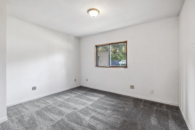 spare room with carpet flooring