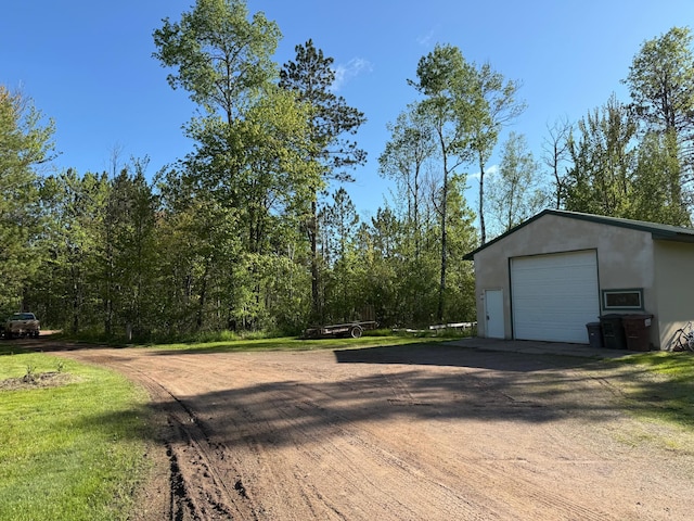 41574 Koland Rd, Sandstone Twp, MN 55072 - detached garage featuring dirt driveway