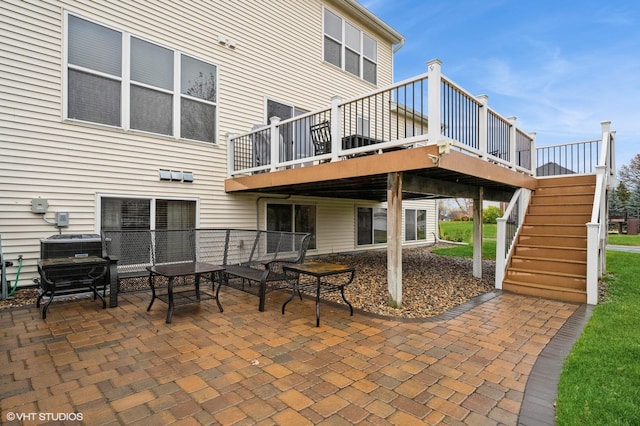 back of house with a patio area