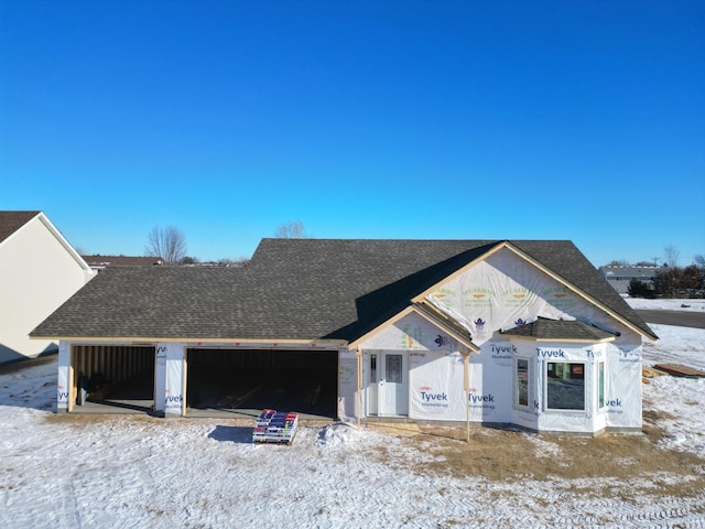 property in mid-construction with a garage