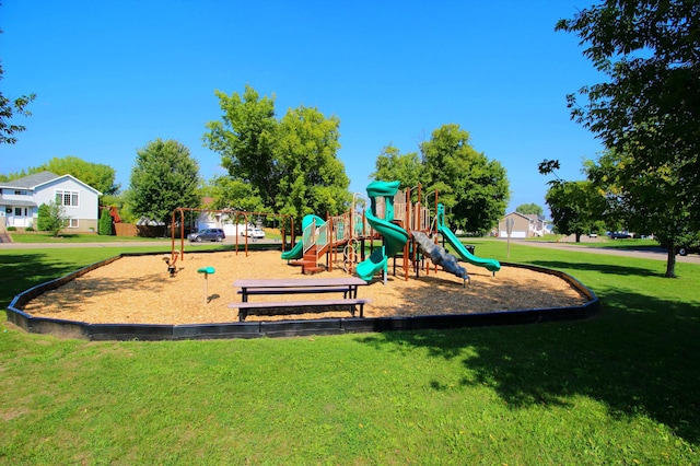 view of play area featuring a lawn