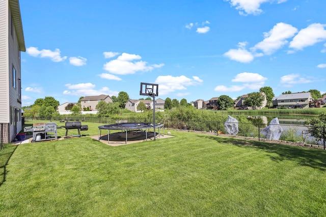 view of yard featuring a trampoline