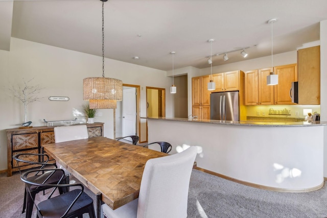 view of carpeted dining room