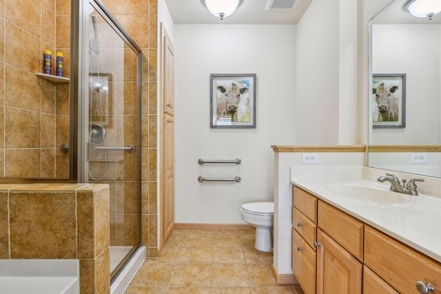 bathroom with toilet, vanity, an enclosed shower, and tile patterned flooring