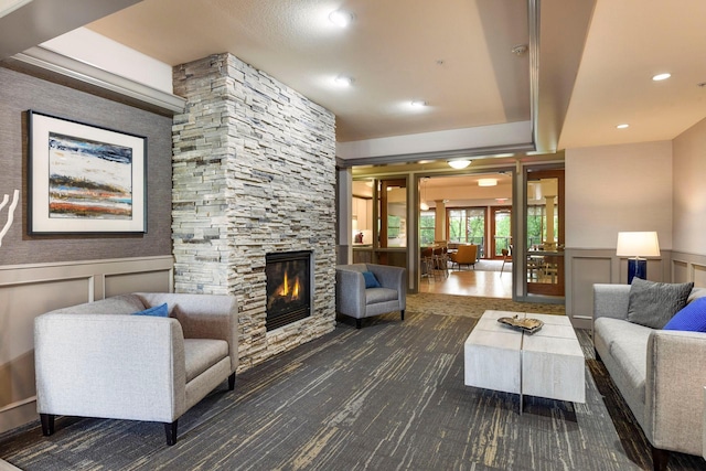 living room featuring a fireplace