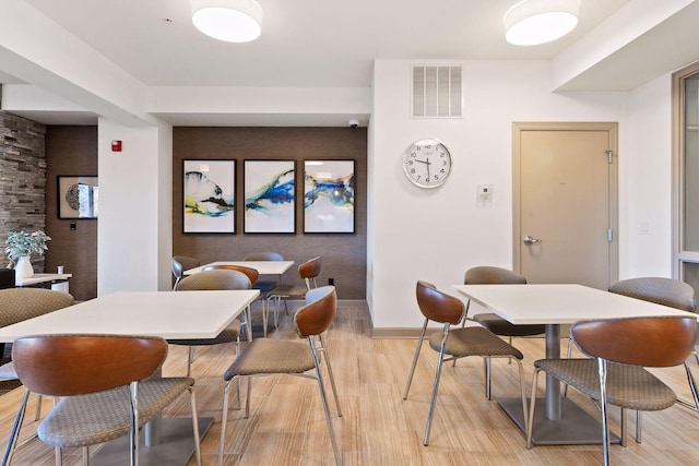 dining area with light wood-type flooring